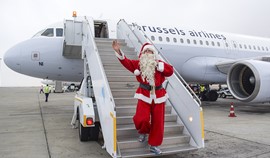 Santa Claus greets the tourists with Christmas gifts at Marsa Alam Airport  Photo